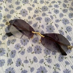 Cartier Gold Tone/Black Panther Rimless Sunglass